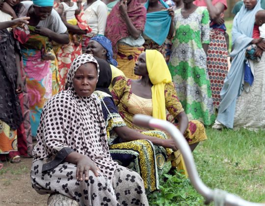 A group of women waiting for NGO empowerment